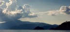 Isola d'elba, dalla barca. Vari interventi in fotoritocco per aumentare la separazione dei diversi piani dell'immagine.