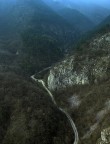 Una vista dall'alto del maschio di castel Avio.
Ho voluto giocare un po' rendendo molto blu la parte alta della foto per cercare di darle un alone di mistero al tutto, mi piaceva molto l'idea di vedere dall'alto di una fortezza una piccola strada che scompare tra le montagne, verso l'ignoto.

Forse i colori sono un po' troppo saturi?
Critiche e commenti sono benvenuti.