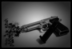 IMITAZIONE BERETTA MODELLO 92FS CALIBRO 9 PARABELLUM IN PLASTICA.
VIGNETTATURA, RAMI E FOGLIE AGGIUNTI CON PHOTOSHOP