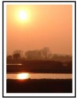 Un bel tramonto in val Vadana, con la nebbia all'orizzonte