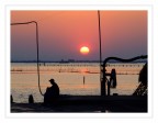 Un pescatore nei pressi di comacchio che si riposa alla fine della giornata tra tubi, cavi e pontili. Ho fatto appena in tempo a scattare, nelle due successive c' lui che mi vede e sia allontana...