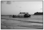 tramonto. Un tratto di mare cos calmo da sembrare un lago, un traghetto silenzioso e deserto attracca...
Brasile, 2001