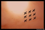 foto scattata nei cieli di Siracusa durante un'esibizione delle frecce tricolori.Dopo un giro di contrasti-saturazini-regola colore con photosshop..... venuto fuori questo! buon modo per mascherare un controluce cosi' forte!!!!
