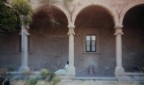 olympus om 10, vivitar 70/210, filtro nebbia. paint shop pro. neat image. Il convento di San Placido  uno dei rari esempi di architettura medievale nei pressi di Messina. L'atmosfera incantata del chiostro  accentuata dall'utilizzo del filtro e dalla figura femminile sdraiata.