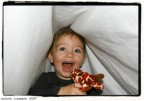 Una foto scattata sotto il lenzuolo in cui si era nascosto mio figlio Alessandro, usando il flash della macchina.

Suggerimenti e critiche sempre ben accetti.