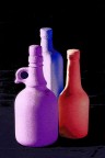 Bottiglie bianche colorate