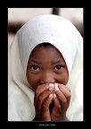 Una scolaretta di fede musulmana di Nungwi (Zanzibar) mi presta il suo timido volto.