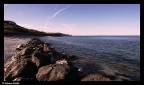 tra il mare e la spiaggia