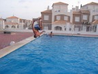 tuffo con salto mortale indietro