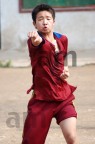 studente di una scuola di Shaolin tradizionale in Cina