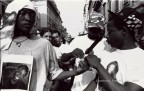 Manifestazione di cordoglio e protesta in occasione dell'uccisione del ragazzo italiano di colore Abdul "Abba" Guibre da parte di un gestore di un bar a Milano. La foto ritrae alcuni amici del ragazzo.