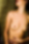 L'illuminazione  data da una piccola lampada di quelle che si mettono sopra lo specchio del lavandino... in quel momento non avevo altre fonti luminose. Questi scatti sono nati per caso, e per me sono stati un felice ritorno al passato (la ragazza  la stessa delle mie foto con la vecchia OM-1) con una attrezzatura completamente nuova (D700 con 70-200 f2.8).