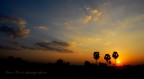 Il sole tramonta sulle pianure del Laos centrale dove buffali d'acqua, palme di cocco e spazi infiniti si fondono assieme per mostrare uno degli scenari pi struggenti sulla terra.