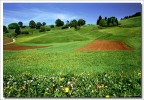 Scansione da Sesia 100. Primavera inoltrata tra prati e coltivazioni biologiche. Zona di lancio per i corsisti di parapendio.