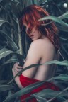 Red hair and green plants