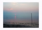Alba sulla bassa marea