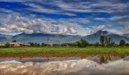 Dopo abbondanti precipitazioni. Vista sulle alte pianure vicentine verso le prealpi. Caldogno (VI), aprile 2025