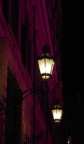Particolare notturno della facciata di Palazzo Reale, a Torino.
Il colore porpora  il riflesso delle luci del palco allestito in Piazza Castello, antistante il palazzo, per le premiazioni ed i concerti delle Olimpiadi Invernali. Scatto "a mano libera", senza cavalletto.