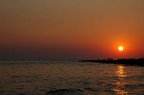Cosi  passata la domenica
sul mare sugli scogli, fino a che
il sole non si 
deciso ad andar gi,
sulla pelle ci rimane il sale del mare
(P.Bertoli)